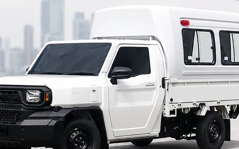 Toyota Hilux Champ with a white Carryboy fiberglass canopy